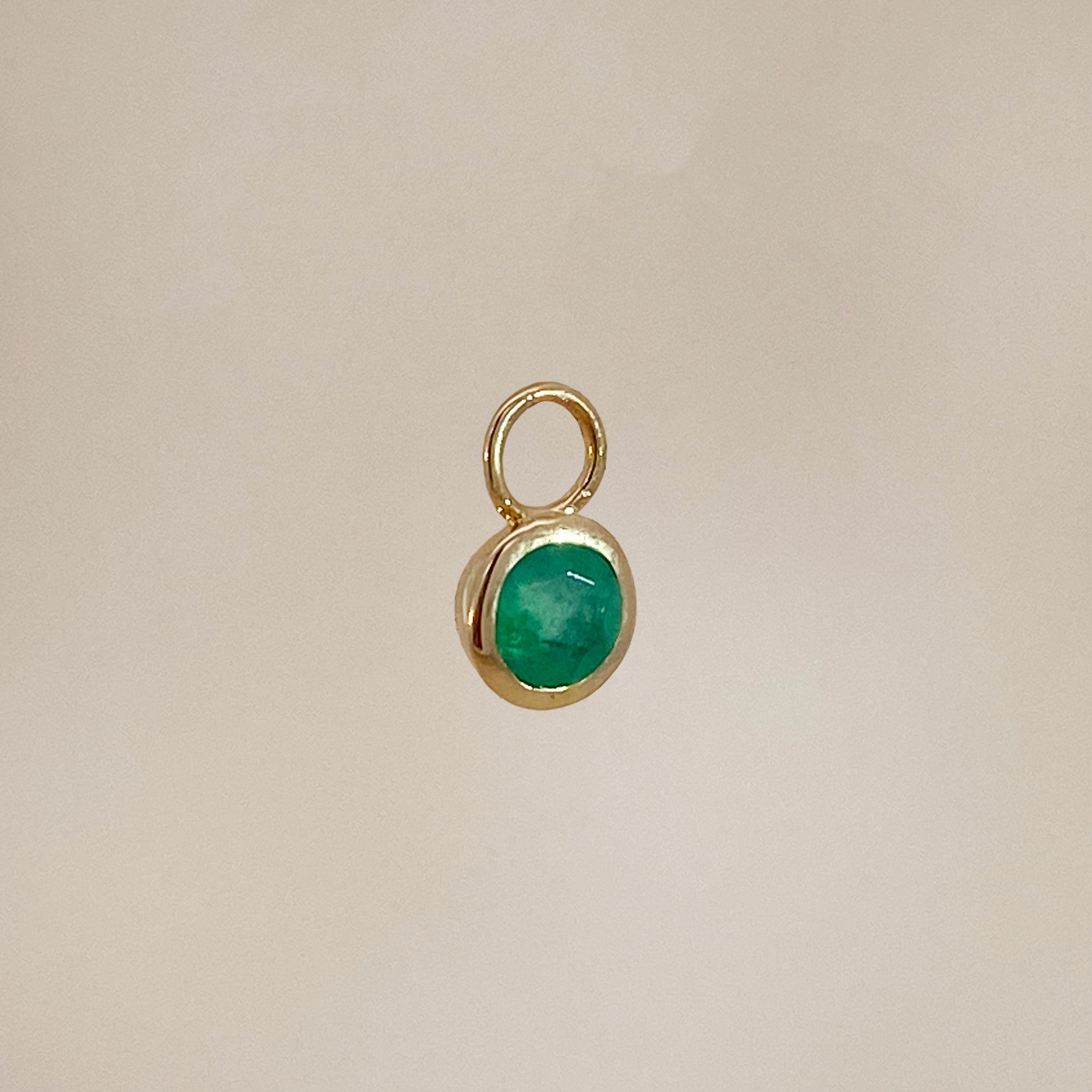 Emerald charm